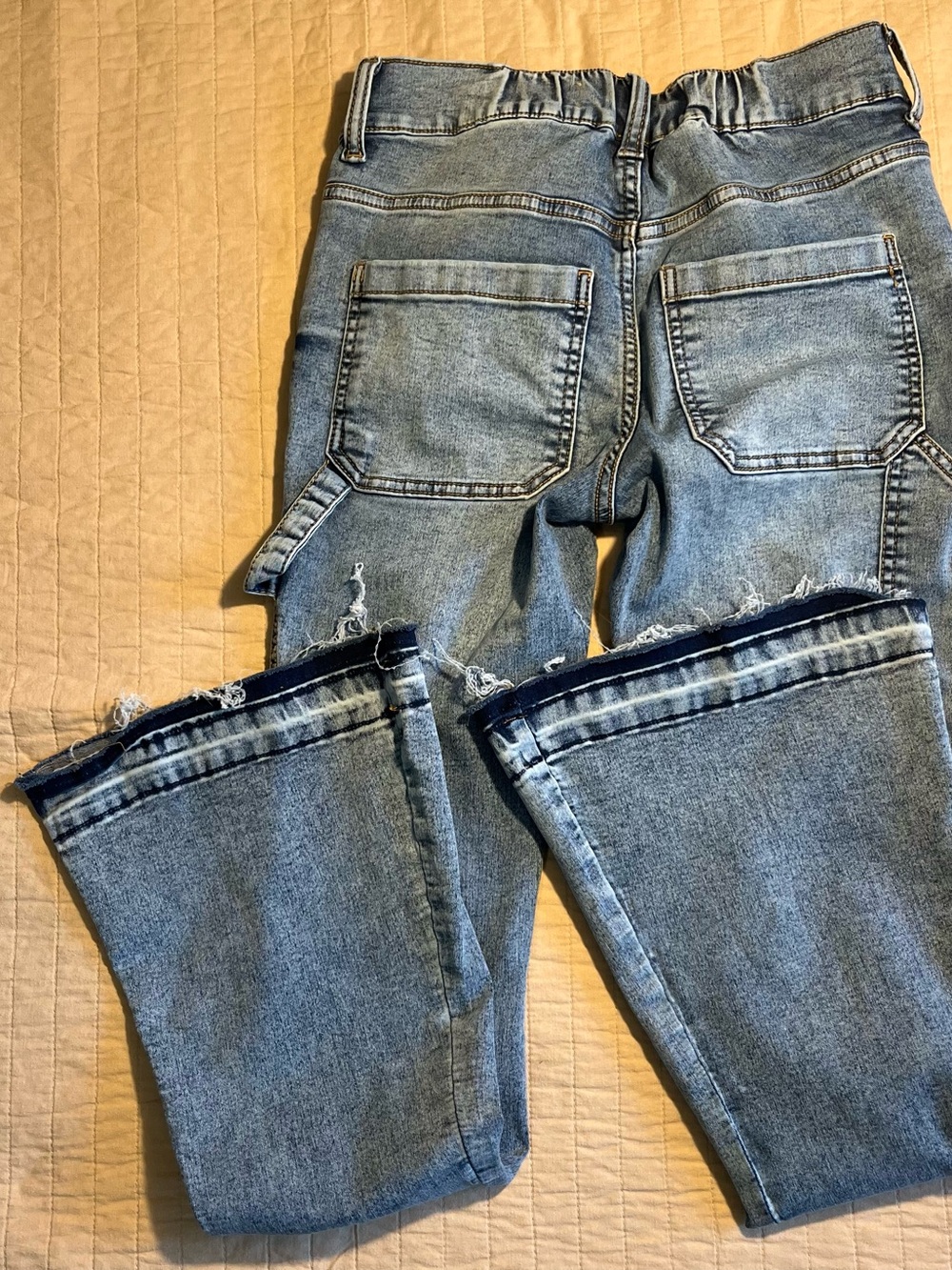 Light Blue Flared Jeans with Raw Hem